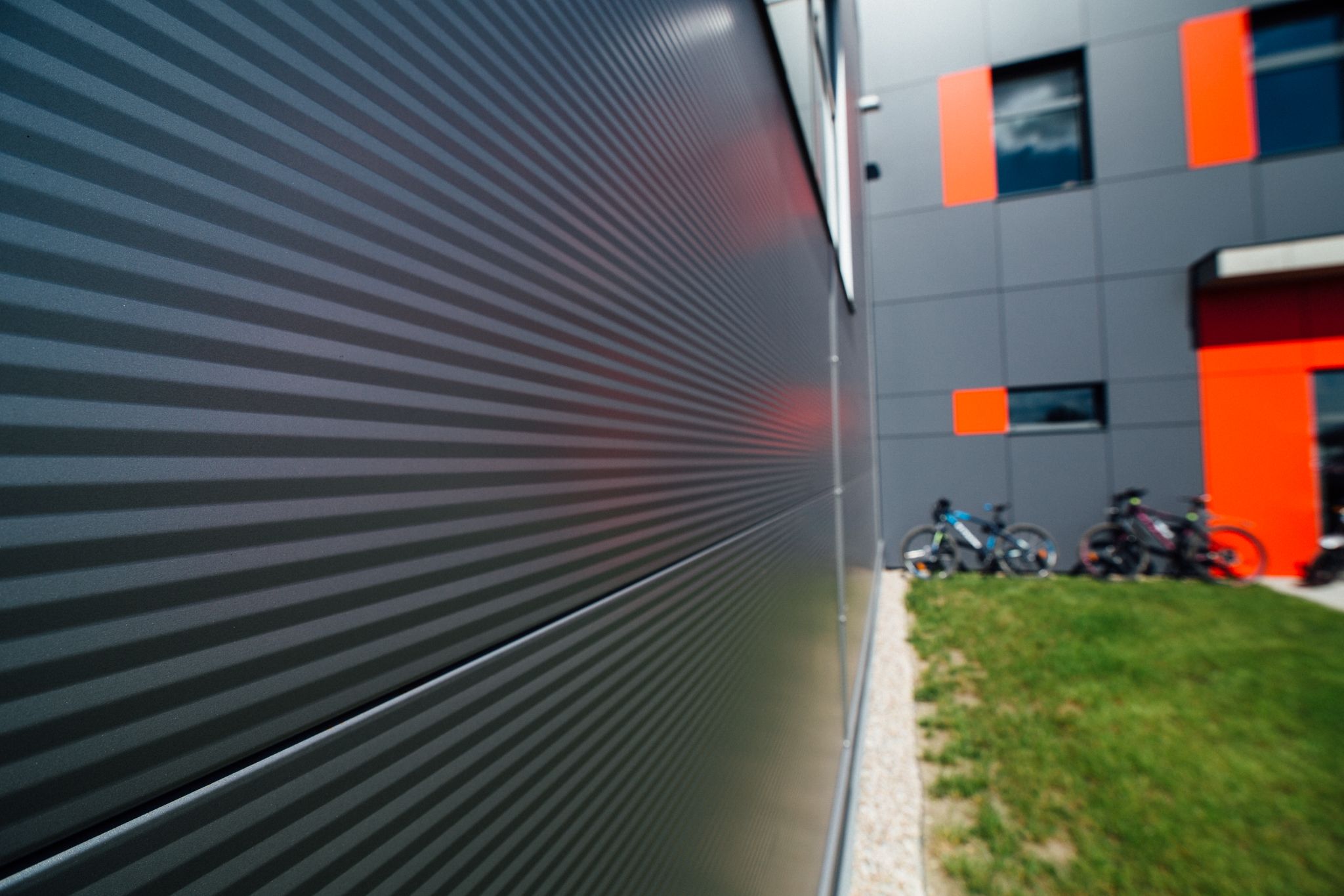 Modern industrial building with walls and roof built from sandwich panels