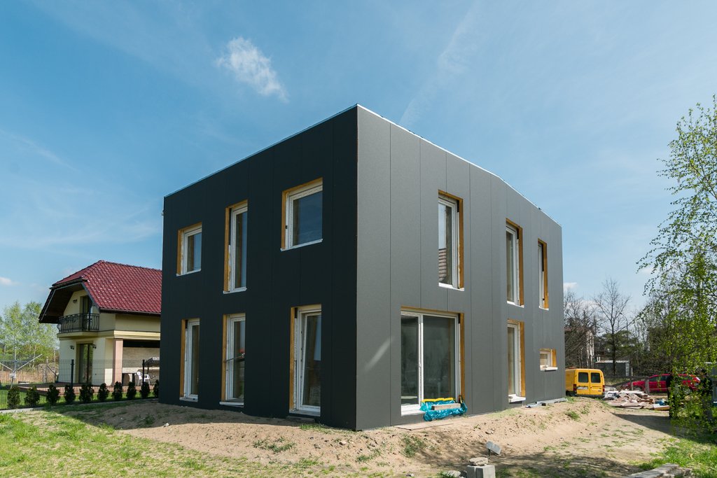 Commercial building with a sandwich panel facade